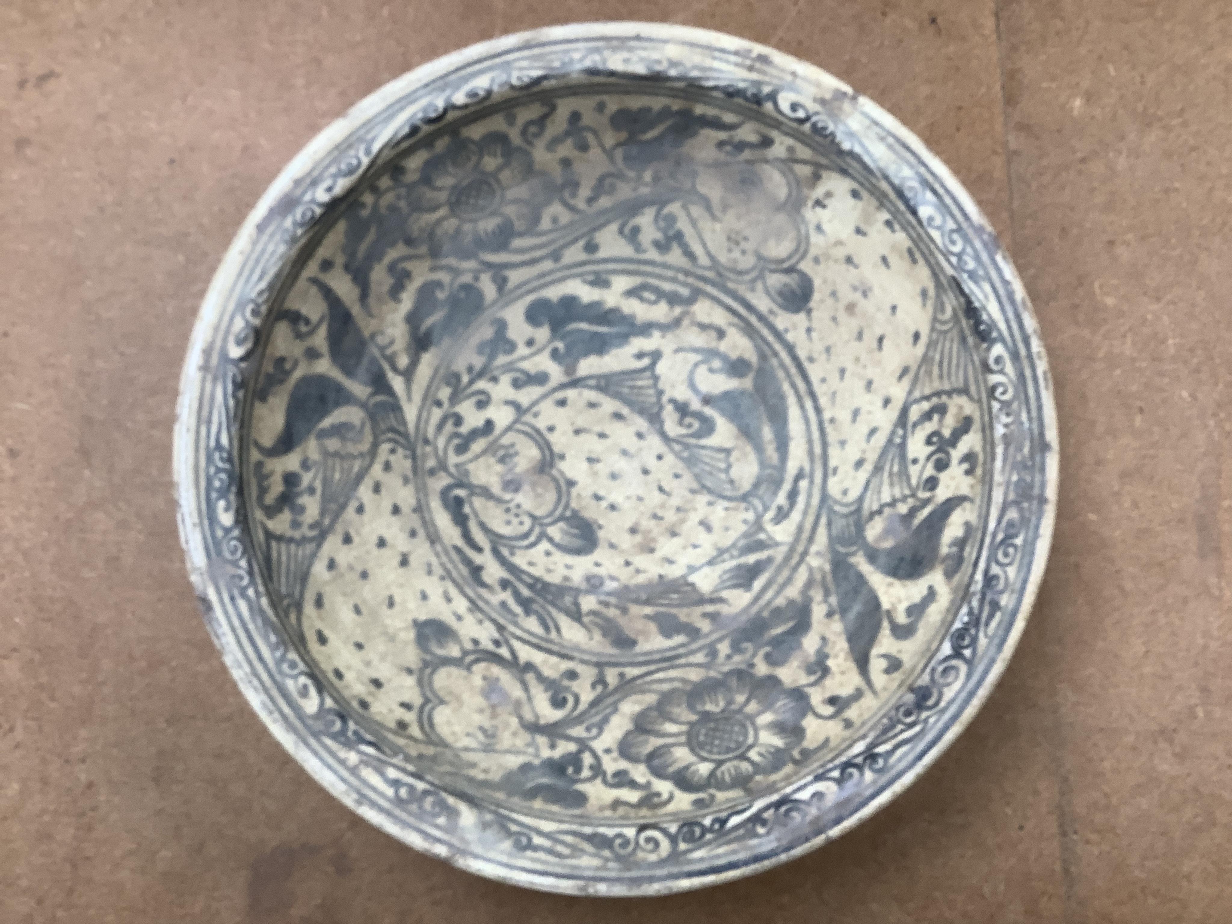 A group of Thai ceramic dishes, possibly Sukothai, largest 36cm